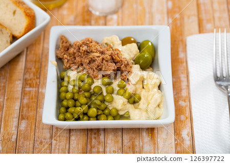 Spanish salad called Ensalada rusa Spanish salad called Ensalada rusa 126397722