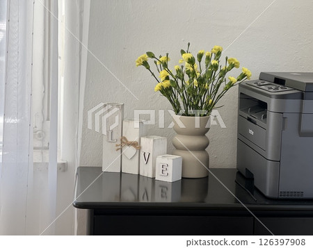 Desktop Decor: Flowers and Candles with LOVE Wording 126397908
