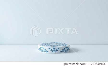 Description: Blue and white elegant Chinese style ceramic display stands with decorative elements and tableware. 126398961