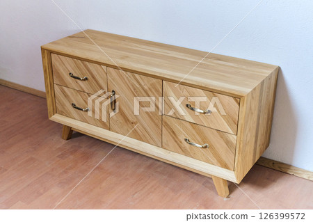 Close-Up of Finished Wooden Products Table and Sideboard 126399572