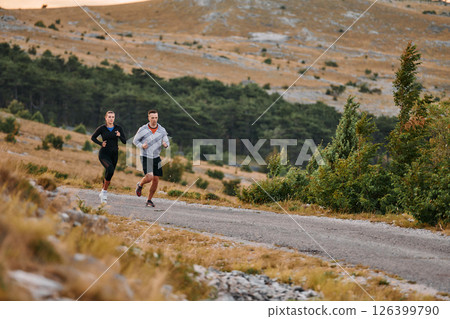 A Couple's Energizing Morning Run in the Mountains 126399790