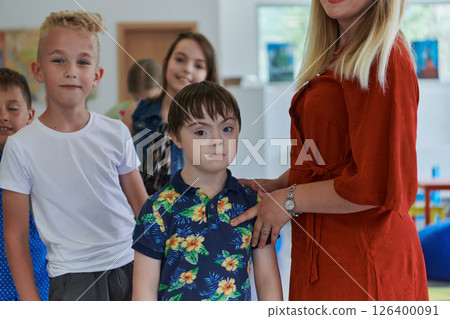 Preschool children wait in line for new and interesting games. Selective focus Preschool children wait in line for new and interesting games. Selective focus 126400091