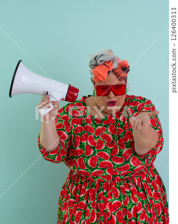 Colorful Retro Woman Shouting Through a Megaphone Colorful Retro Woman Shouting Through a Megaphone 126400313