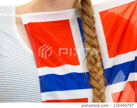 Young woman holding norwegian flag 126400797
