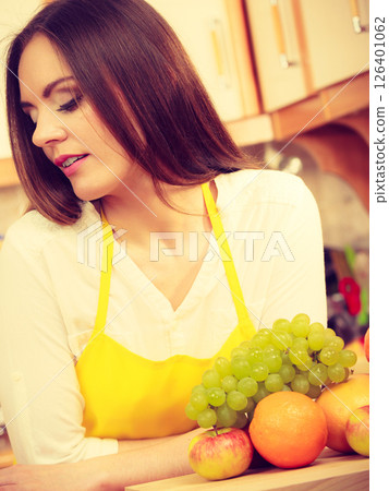 Gorgeous cook preparing dish. Gorgeous cook preparing dish. 126401062