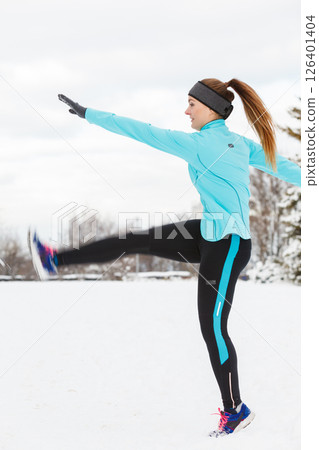 Winter sport, girl exercising in park Winter sport, girl exercising in park 126401404