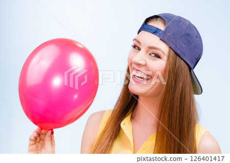 Happy teenage girl with red balloon. 126401417
