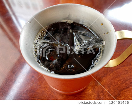 Cold iced coffee in a copper mug 126401436