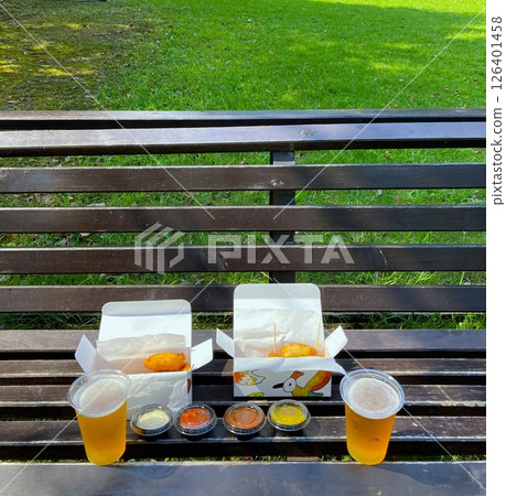 Drinking beer in the park Drinking beer in the park 126401458