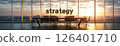 Modern Conference Room with Strategy Sign at Sunset 126401710
