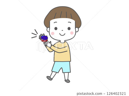 Smiling child playing castanets 126402321