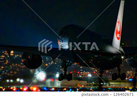 Airplane to take off from Itami Airport Airplane to take off from Itami Airport 126402671