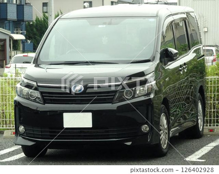 A car parked in a parking lot (Toyota Voxy 3rd generation) 126402928