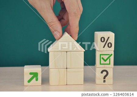 Businessman builds a mini house 126403614