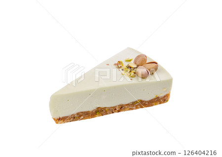 Pistachio Cheesecake Slice Isolated on White Background Pistachio Cheesecake Slice Isolated on White Background 126404216