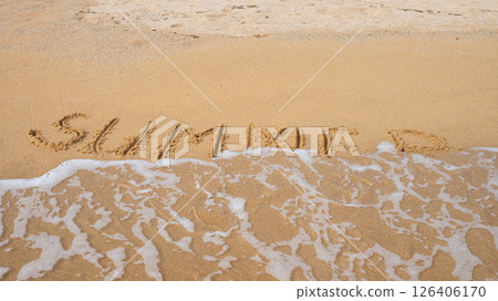 Summer beach waves covering sand writing 126406170
