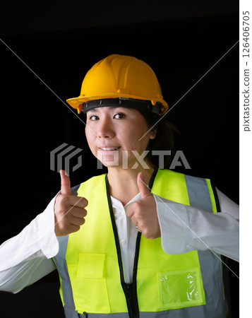 factory woman workers or technicians civil Engineer or Architecture project management give thumb up. 126406705