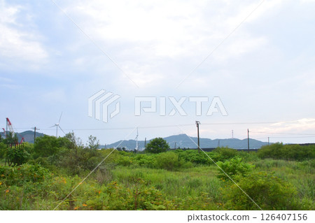 Scenery from Higashimuroran to Muroran Station on JR Hokkaido's Muroran branch line (cloudy in summer 2023) Scenery from Higashimuroran to Muroran Station on JR Hokkaido's Muroran branch line (cloudy in summer 2023) 126407156