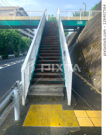 Stairs of a pedestrian overpass 126407564