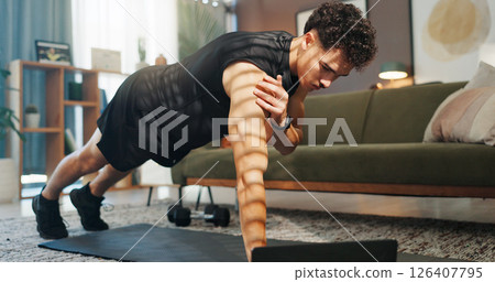 Fitness, laptop and man in home for workout, exercise and training for muscle strength on website. Sports, house and person with computer for online tutorial or video for push up, plank and balance Fitness, laptop and man in home for workout, exercise and training for muscle strength on website. Sports, house and person with computer for online tutorial or video for push up, plank and balance 126407795