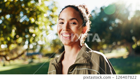 Fitness, woman and happy with portrait at park for morning workout, cardio exercise and ready for training. Athlete, runner and smile in nature for wellness routine, running performance or confidence 126407822