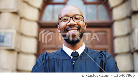 Portrait, smile and black man judge in city for trial report, policy legislation and legal documents. Lawyer, attorney and confidence with happy person at courtroom outdoor for government justice 126407960