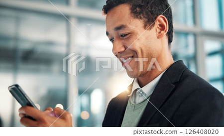 Business man, smile and typing with phone in office for stock market profit, good news or investment feedback. Professional, happy trader and smartphone for reading economy information or finance app 126408020