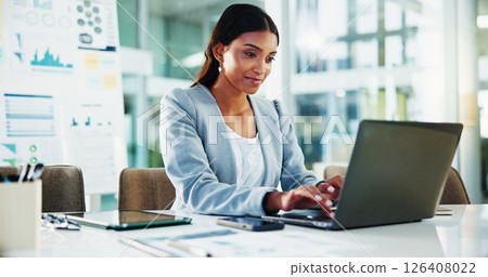 Finance, businesswoman and typing on laptop at desk for tax compliance report, risk management and auditing review. Reading, accountant and technology for financial proposal and investment project 126408022