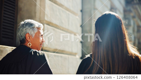 Discussion, walking and business women in city planning for legal case outdoor with collaboration. Conversation, manager and attorney working on corporate legislation project with commuting in town. 126408064