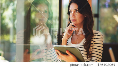 Remote work, tablet and thinking with woman at window in living room of apartment for idea or research. App, problem solving and vision with mature freelance employee in home office for planning Remote work, tablet and thinking with woman at window in living room of apartment for idea or research. App, problem solving and vision with mature freelance employee in home office for planning 126408065