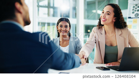 Handshake, meeting and business women with smile in interview for recruitment, deal or welcome. Happy, thank you and human resources employee shaking hands with a worker for onboarding or agreement 126408104