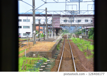 JR Hokkaido, Muroran Main Line, local train window view from Higashimuroran Station to Noboribetsu Station (cloudy sky in summer 2023) JR Hokkaido, Muroran Main Line, local train window view from Higashimuroran Station to Noboribetsu Station (cloudy sky in summer 2023) 126408177