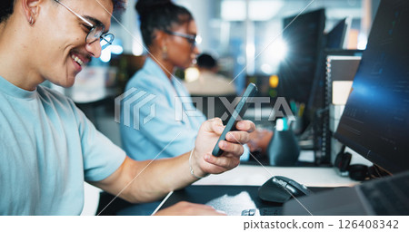 Computer, businessman and programmer with smartphone in office, coding software and download app. Coworking, male person and developer with mobile for web analytics, seo update and typing on break 126408342