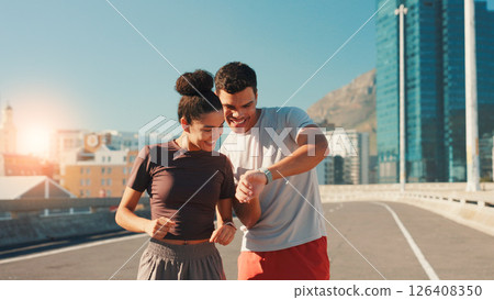 Happy team, fitness and checking watch with performance tracker for workout results in city street. Man, woman or runners with smile or wristwatch for health, calories or exercise goals in urban town Happy team, fitness and checking watch with performance tracker for workout results in city street. Man, woman or runners with smile or wristwatch for health, calories or exercise goals in urban town 126408350