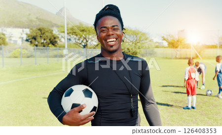 Portrait, coach and man with ball, soccer and confident for training routine, happy and outdoor. Sports field, trainer and person with smile in morning, proud and fitness for football or laughing Portrait, coach and man with ball, soccer and confident for training routine, happy and outdoor. Sports field, trainer and person with smile in morning, proud and fitness for football or laughing 126408353