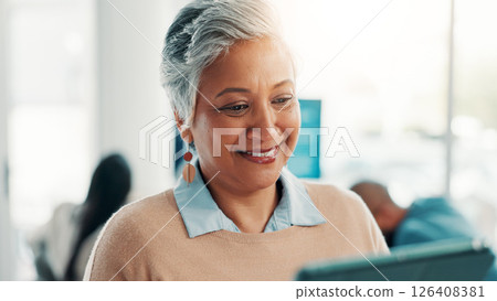 Business, development and tablet with woman in office for corporate research or online planning. App, information and smile with mature employee in professional workplace for connectivity or update 126408381