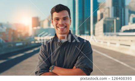 Arms crossed, fitness and portrait of man on bridge in city for cardio workout or marathon training. Exercise, smile and sports with happy athlete or runner outdoor in urban town for challenge Arms crossed, fitness and portrait of man on bridge in city for cardio workout or marathon training. Exercise, smile and sports with happy athlete or runner outdoor in urban town for challenge 126408393