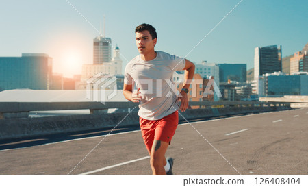 Man, running and fitness with city street for workout, cardio exercise or outdoor training. Active, male person or runner with lens flare on road for physical activity, health or wellness in town 126408404