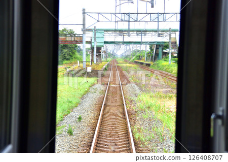JR Hokkaido, Muroran Main Line, local train window view from Noboribetsu Station to Shiraoi Station (cloudy sky in summer 2023) JR Hokkaido, Muroran Main Line, local train window view from Noboribetsu Station to Shiraoi Station (cloudy sky in summer 2023) 126408707