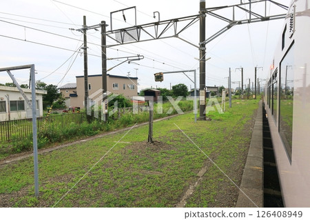 JR Hokkaido, Muroran Main Line, local train window view from Shiraoi Station to Tomakomai Station (cloudy sky in summer 2023) JR Hokkaido, Muroran Main Line, local train window view from Shiraoi Station to Tomakomai Station (cloudy sky in summer 2023) 126408949