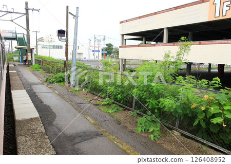 JR Hokkaido, Muroran Main Line, local train window view from Shiraoi Station to Tomakomai Station (cloudy sky in summer 2023) JR Hokkaido, Muroran Main Line, local train window view from Shiraoi Station to Tomakomai Station (cloudy sky in summer 2023) 126408952