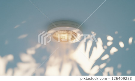 Smoke detector fire alarm in action 126409288