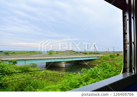Scenery from Tomakomai Station to Mukawa Station on the JR Hokkaido Hidaka Main Line (cloudy in summer 2023) 126409766