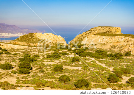 Rocky coast Landscape with ship on sea, Spain Rocky coast Landscape with ship on sea, Spain 126410983