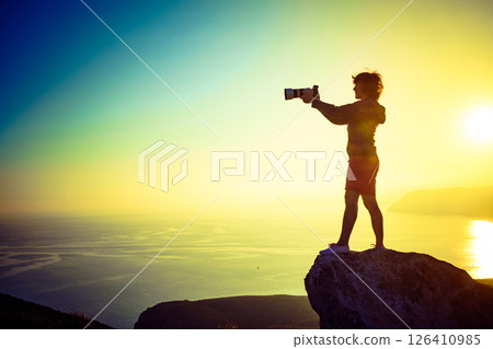 Woman with camera take travel photo Woman with camera take travel photo 126410985