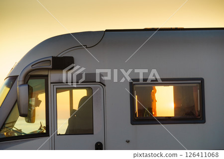 Caravan on coast at sunset 126411068