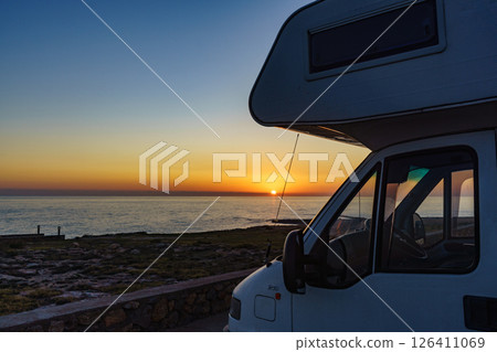 Camper car on sea at sunset 126411069