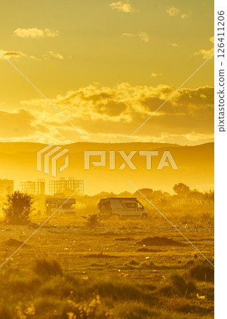Caravans on nature at sunset 126411206