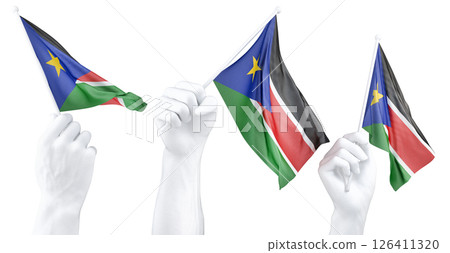 Hand holding flag of South Sudan. Isolated 3d Rendering Hand holding flag of South Sudan. Isolated 3d Rendering 126411320