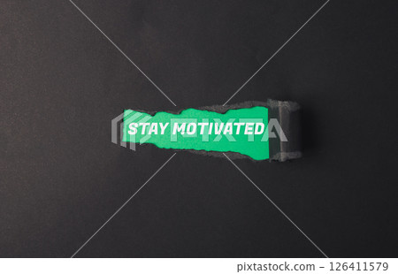 A green sign that says Stay Motivated A green sign that says Stay Motivated 126411579